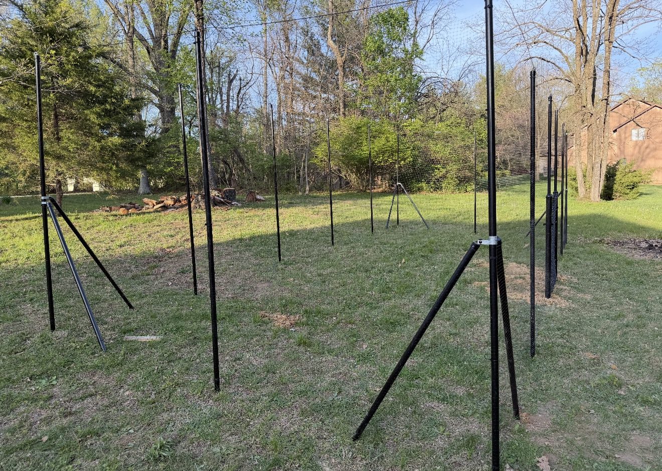 Black metal fence post installation in Bloomington, IN
